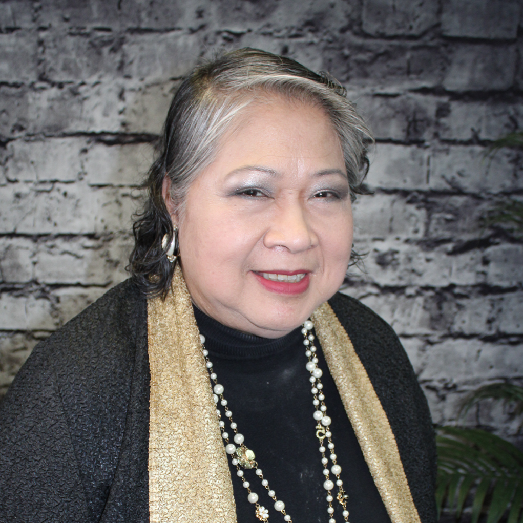 A professional portrait of an experienced female business advisor, ready to offer strategic consultation and advice to clients.