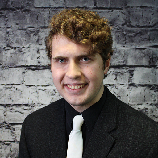 Professional image of Connor Crome, an audio/visual technician, focused on client-facing technical projects.