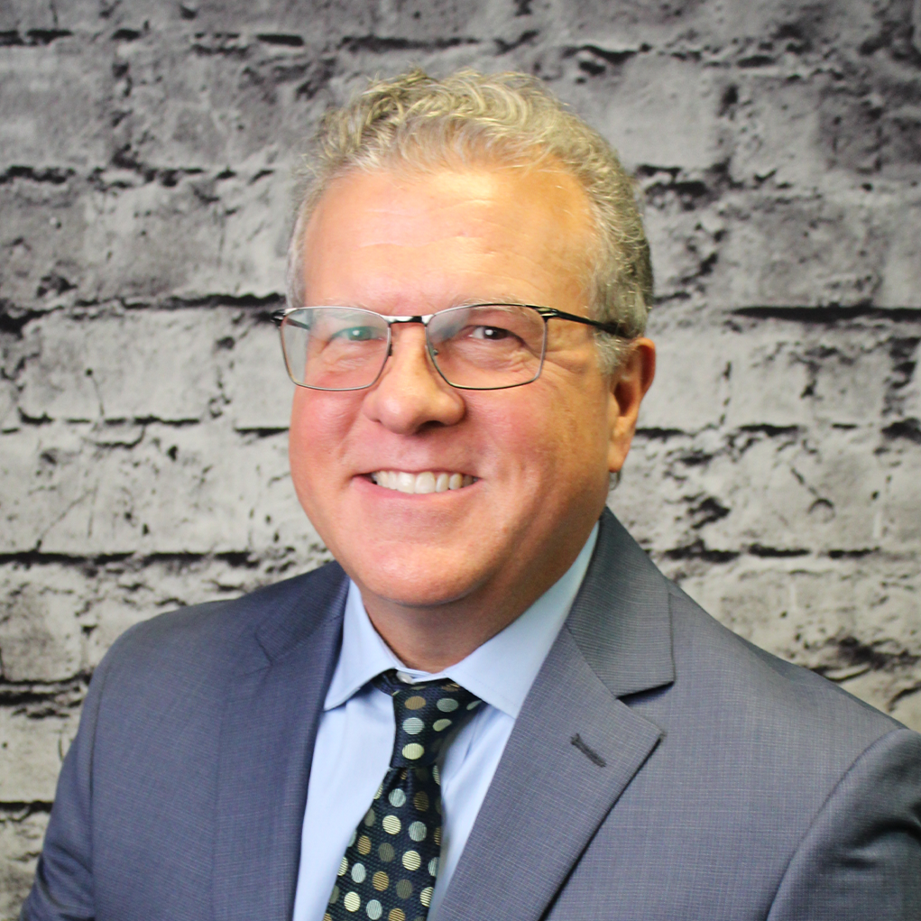 A headshot of Derek Tidwell, a trust sales coordinator, helping clients manage their wealth and trust assets.